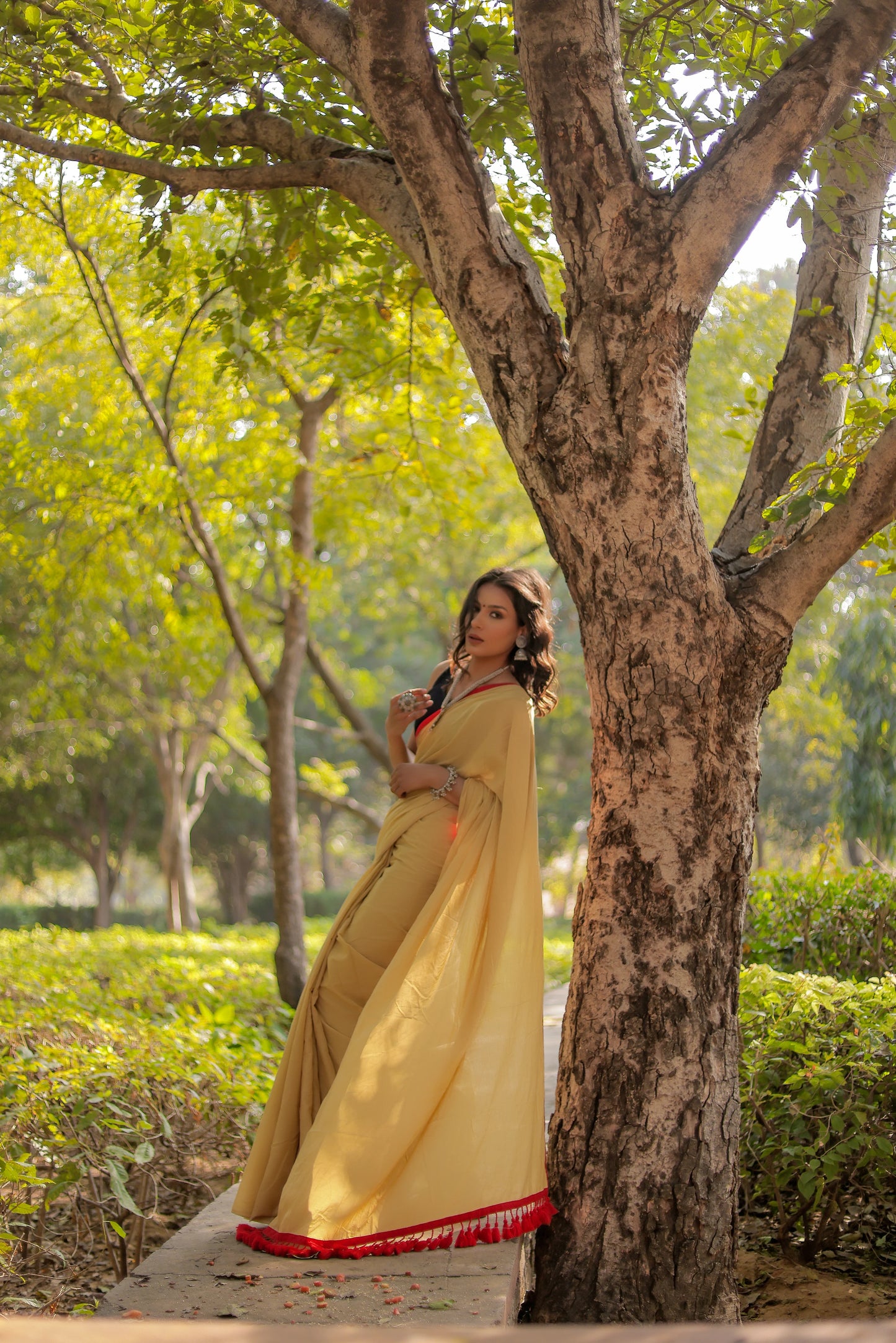 Light mustard cotton saree with red border and tussels