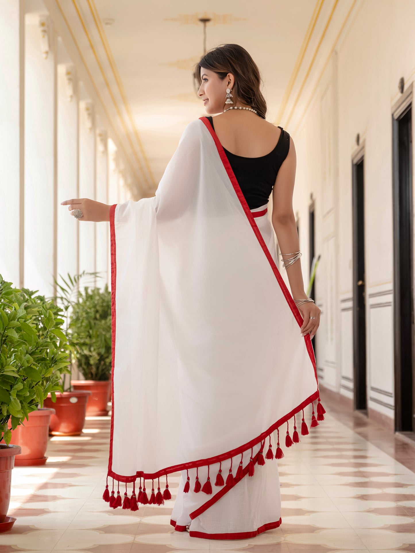 White saree with Red Tussells & Border Pure mul cotton