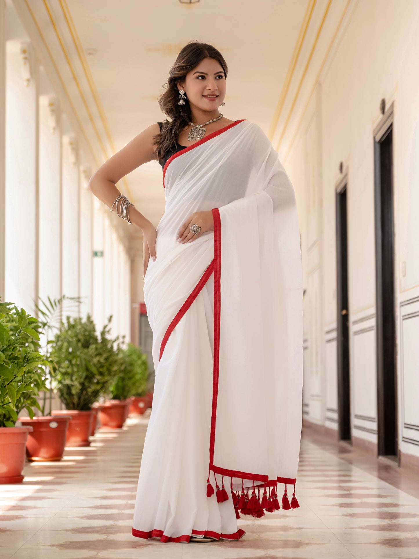 White saree with Red Tussells & Border Pure mul cotton
