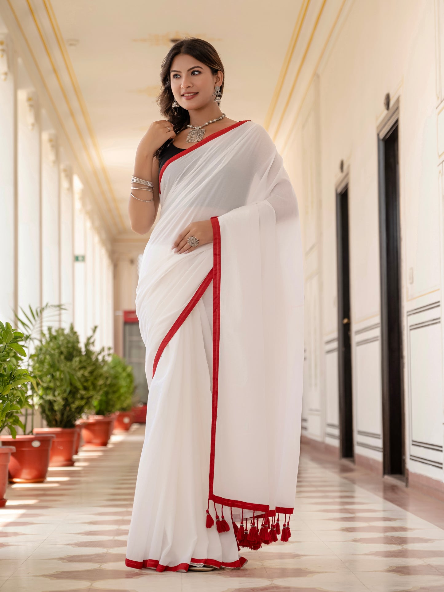 White saree with Red Tussells & Border Pure mul cotton
