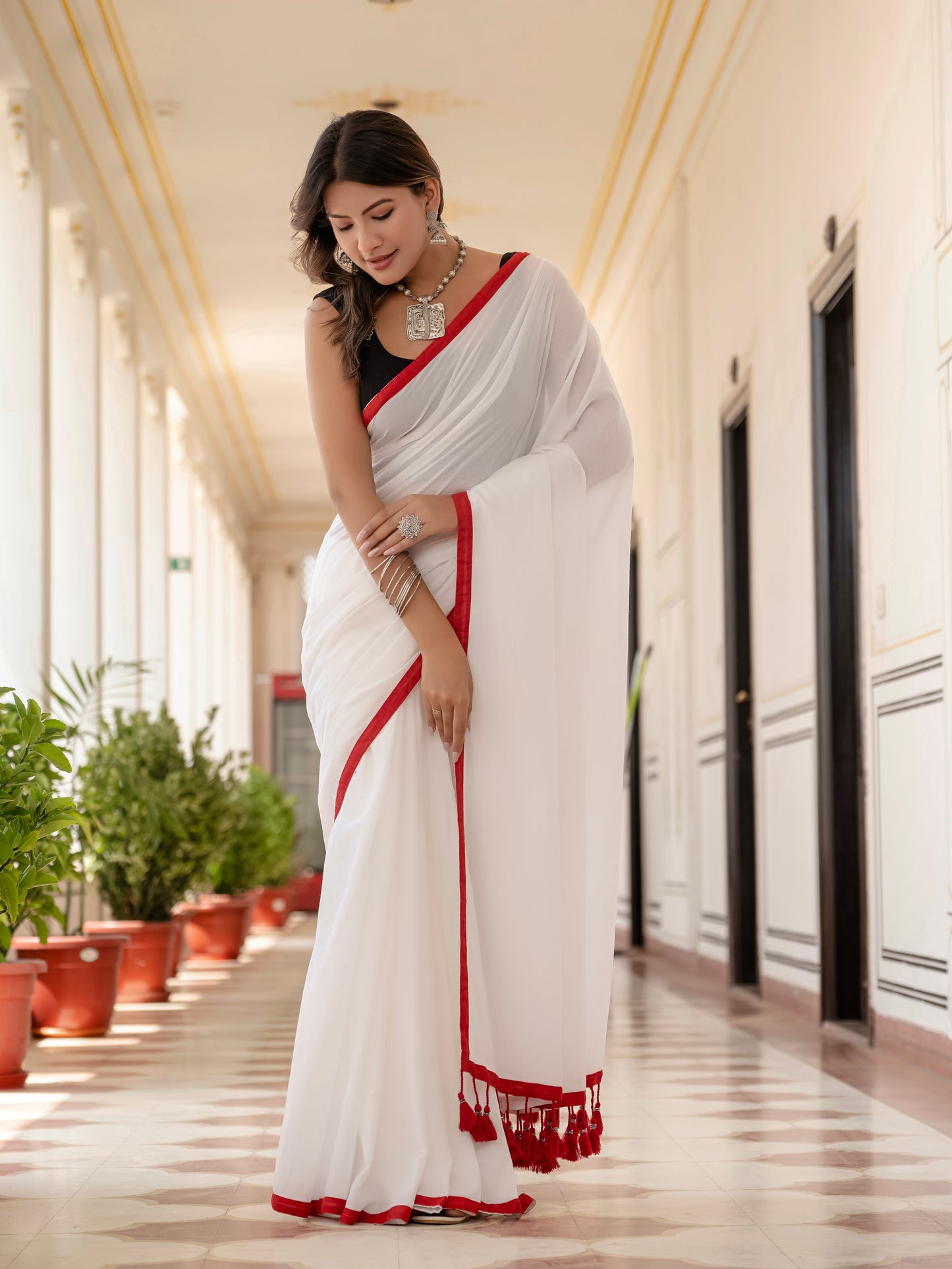 White saree with Red Tussells & Border Pure mul cotton