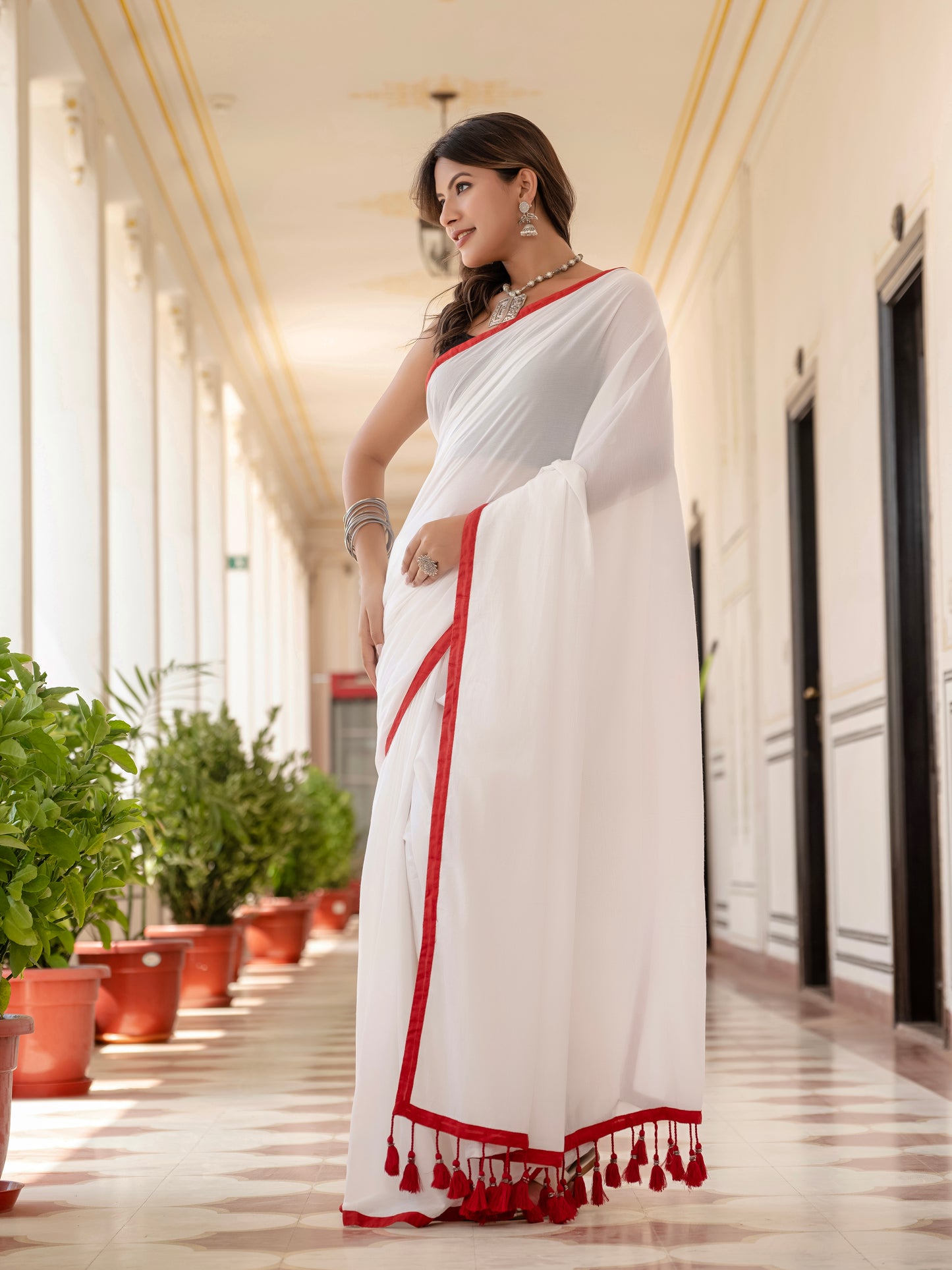 White saree with Red Tussells & Border Pure mul cotton