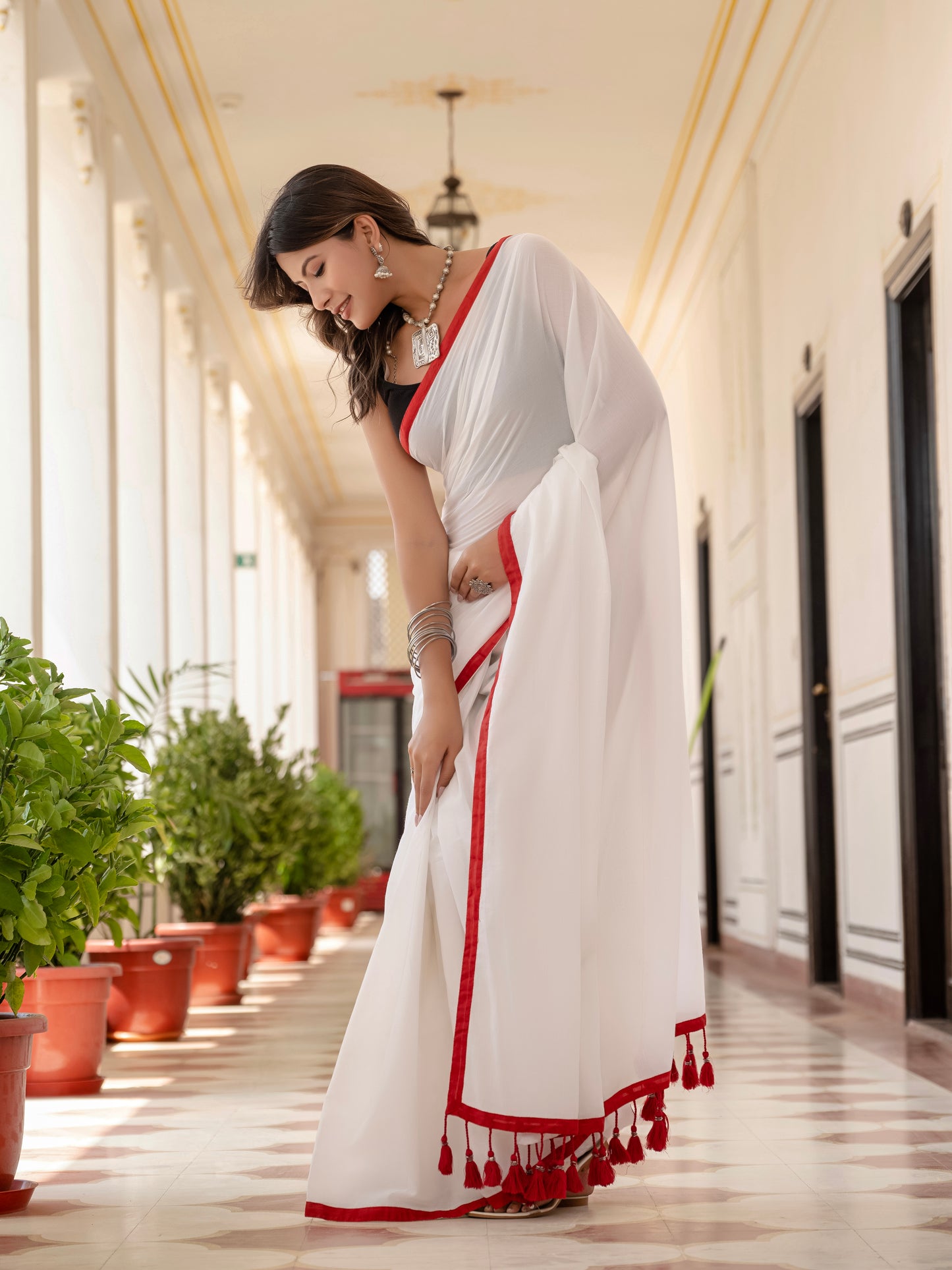 White saree with Red Tussells & Border Pure mul cotton