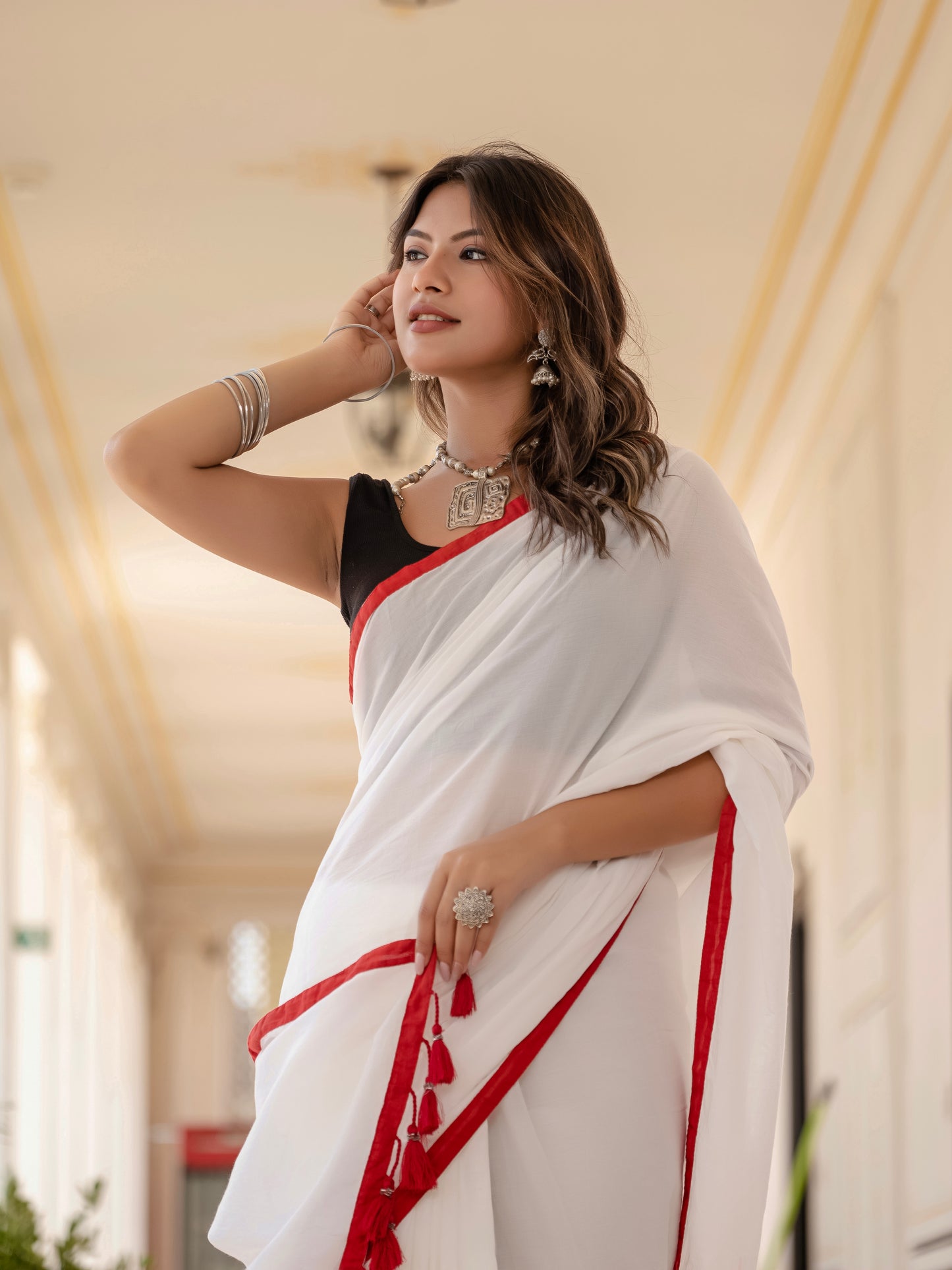 White saree with Red Tussells & Border Pure mul cotton