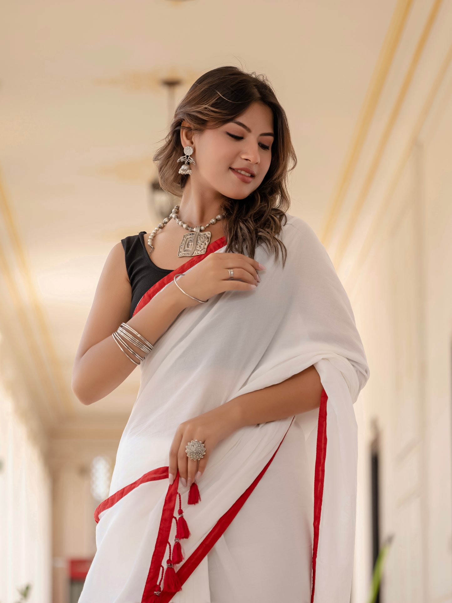 White saree with Red Tussells & Border Pure mul cotton