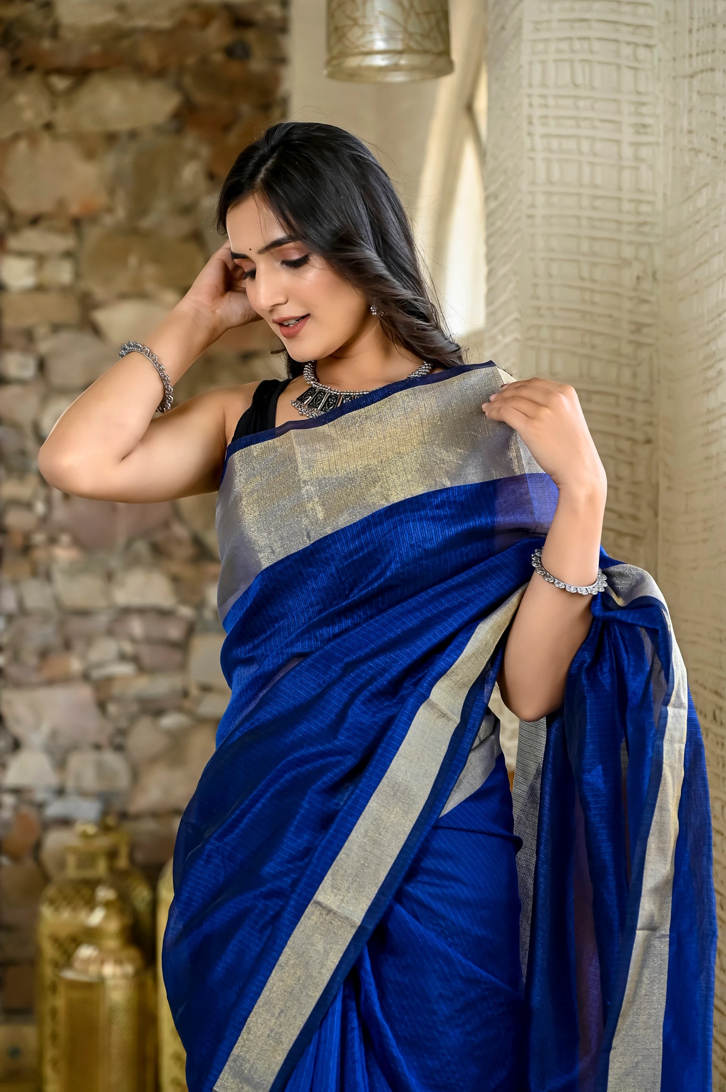 Navy blue color kota silk sarees with heavy zari border