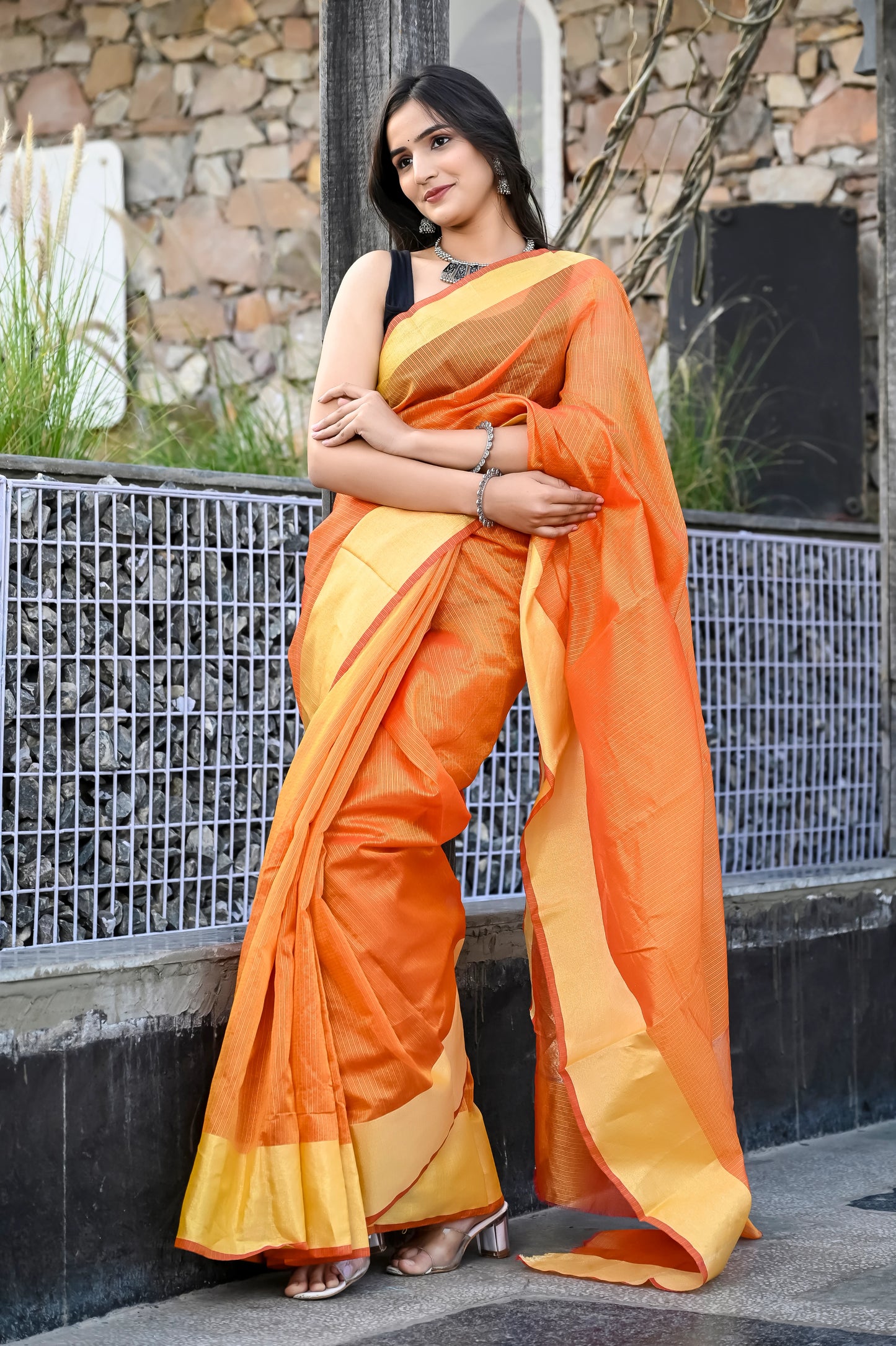 Orange color kota silk saree with heavy border