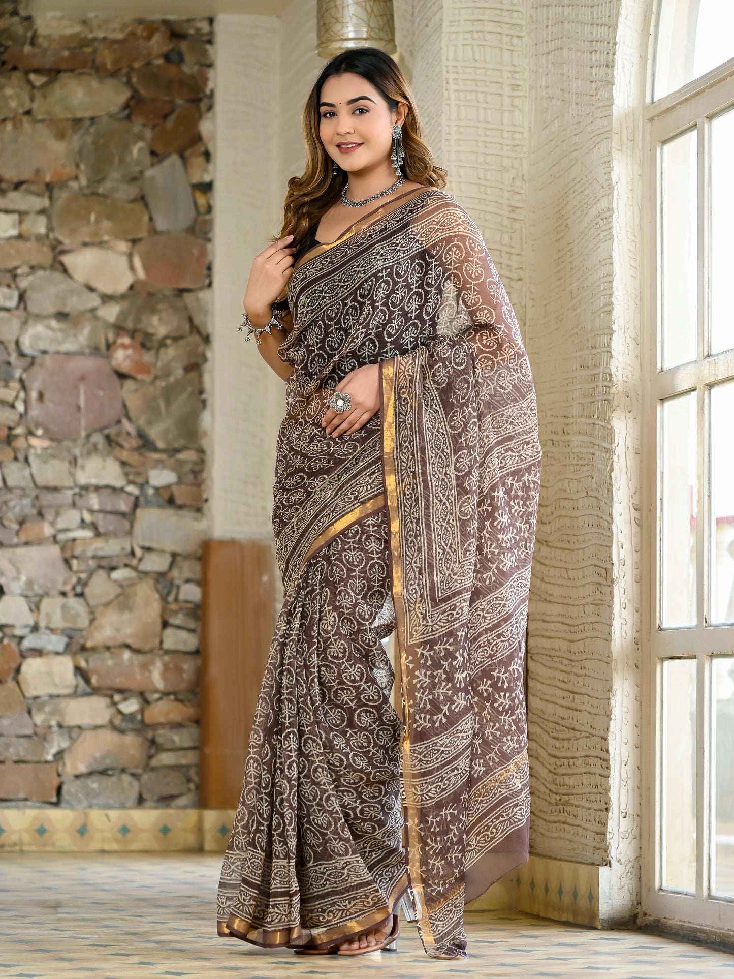 Brown jhaal hand block print pure kota doria saree