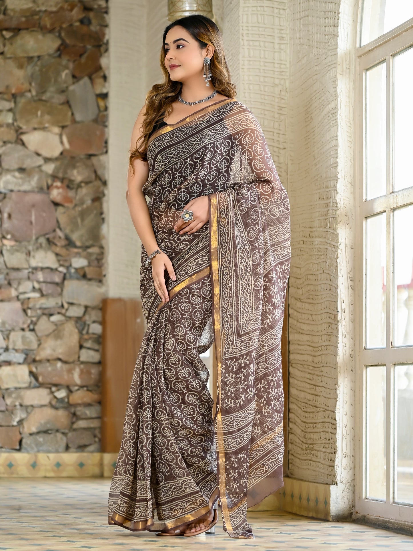 Brown jhaal hand block print pure kota doria saree