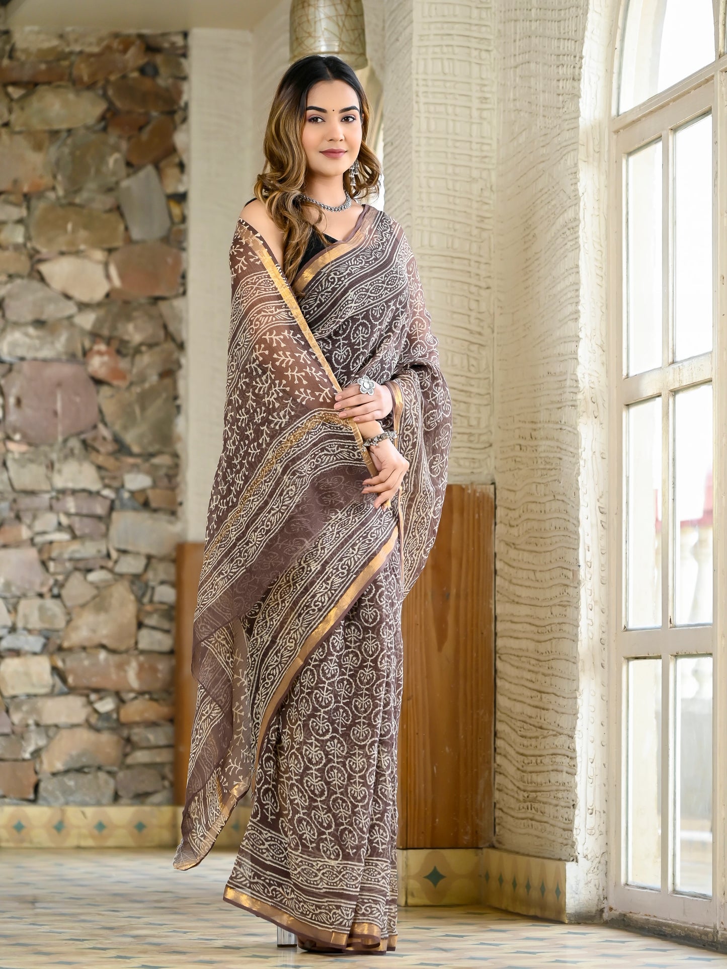 Brown jhaal hand block print pure kota doria saree