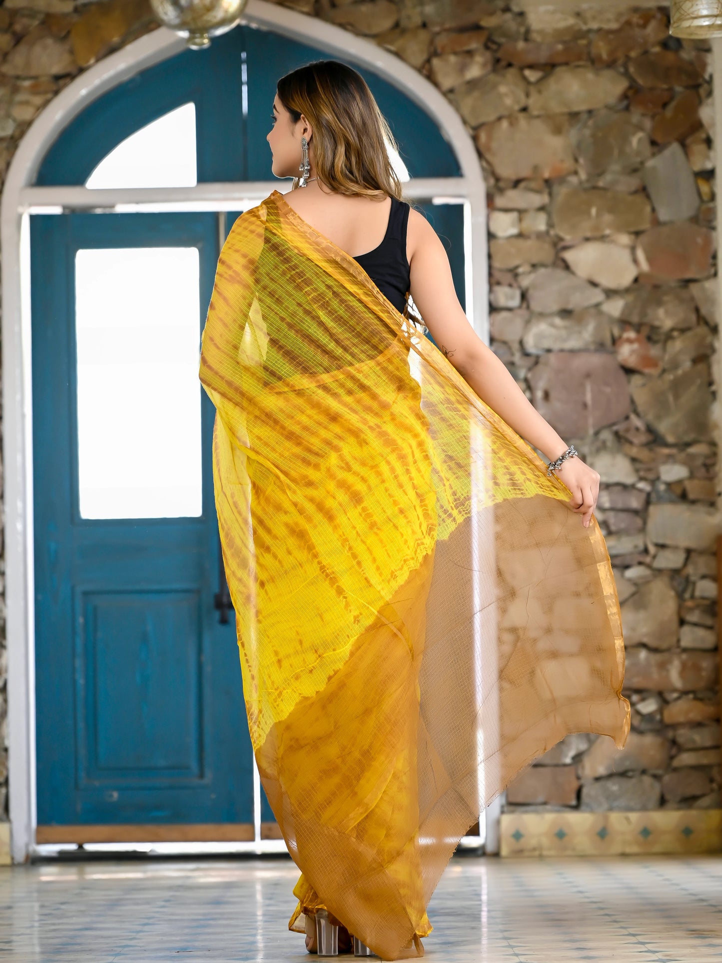 Yellow tie die print pure kota doria saree
