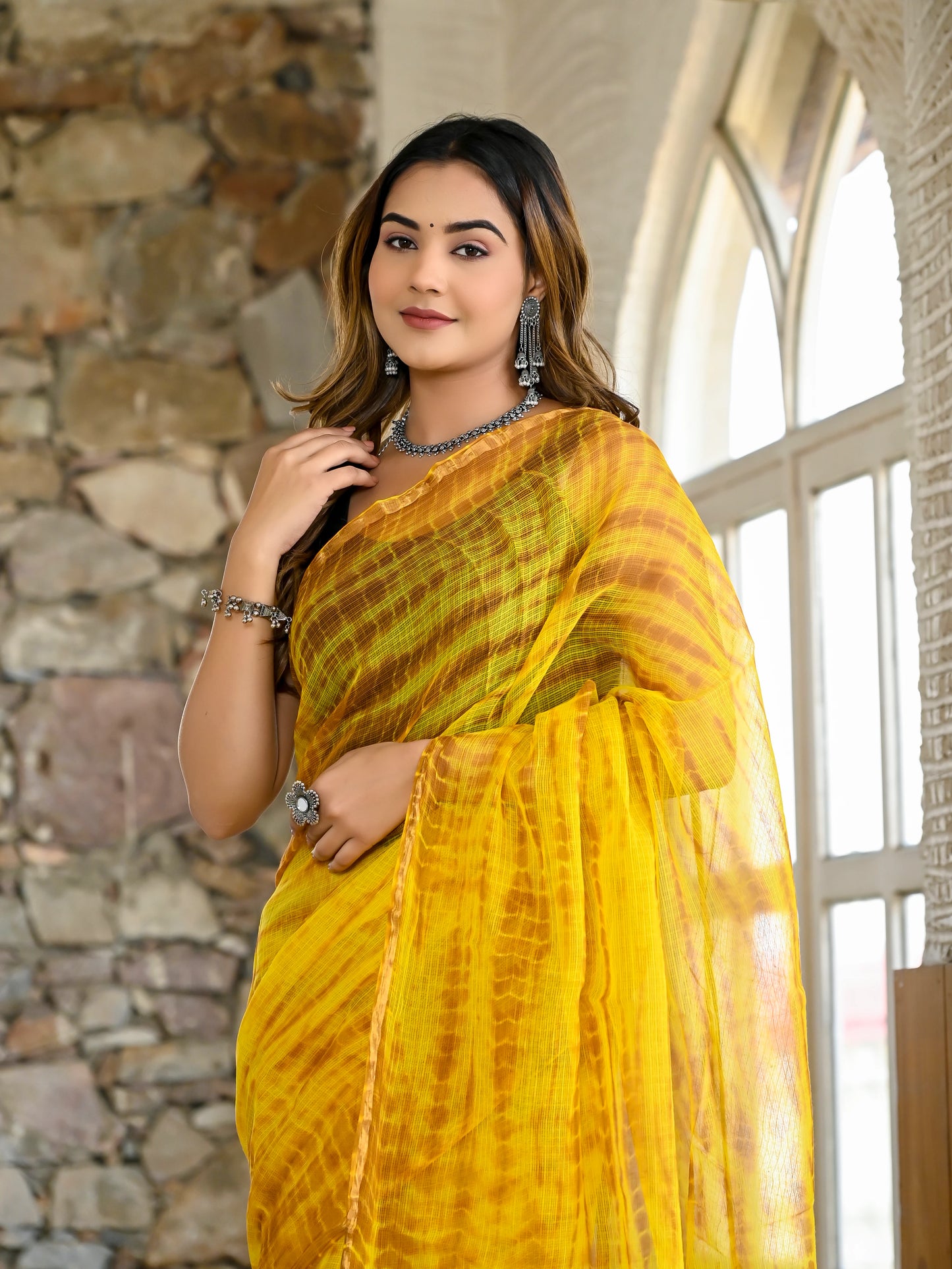 Yellow tie die print pure kota doria saree
