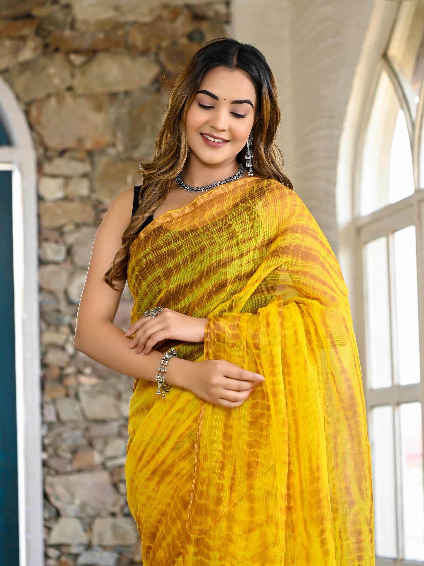 Yellow tie die print pure kota doria saree