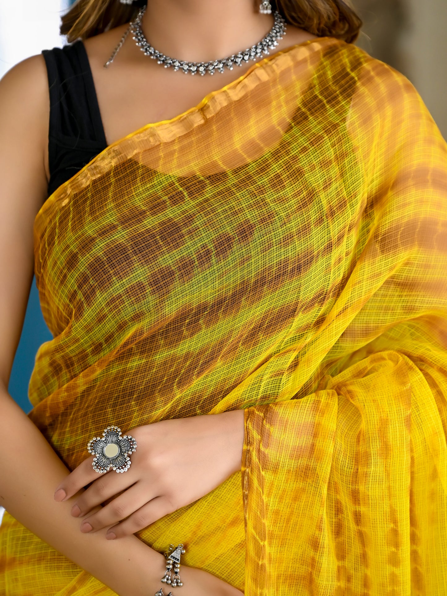 Yellow tie die print pure kota doria saree