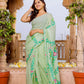 Pista green floral hand painted mul cotton saree