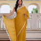 Mustard saree with tussells