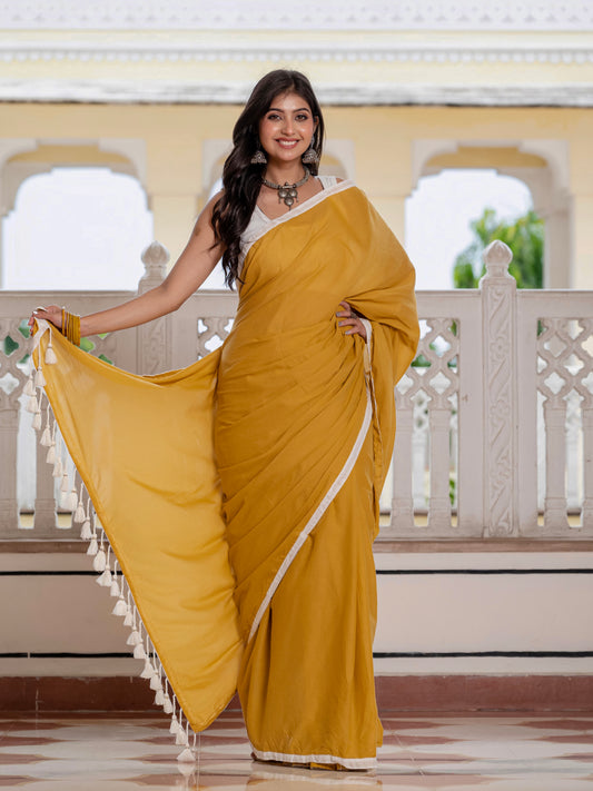 Mustard saree with tussells