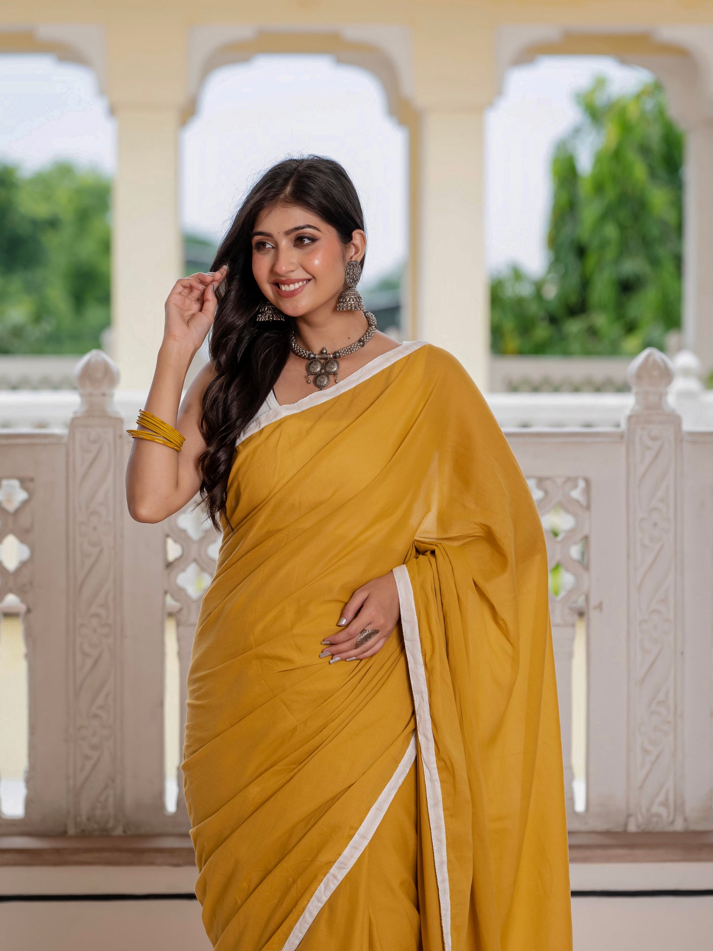 Mustard saree with tussells