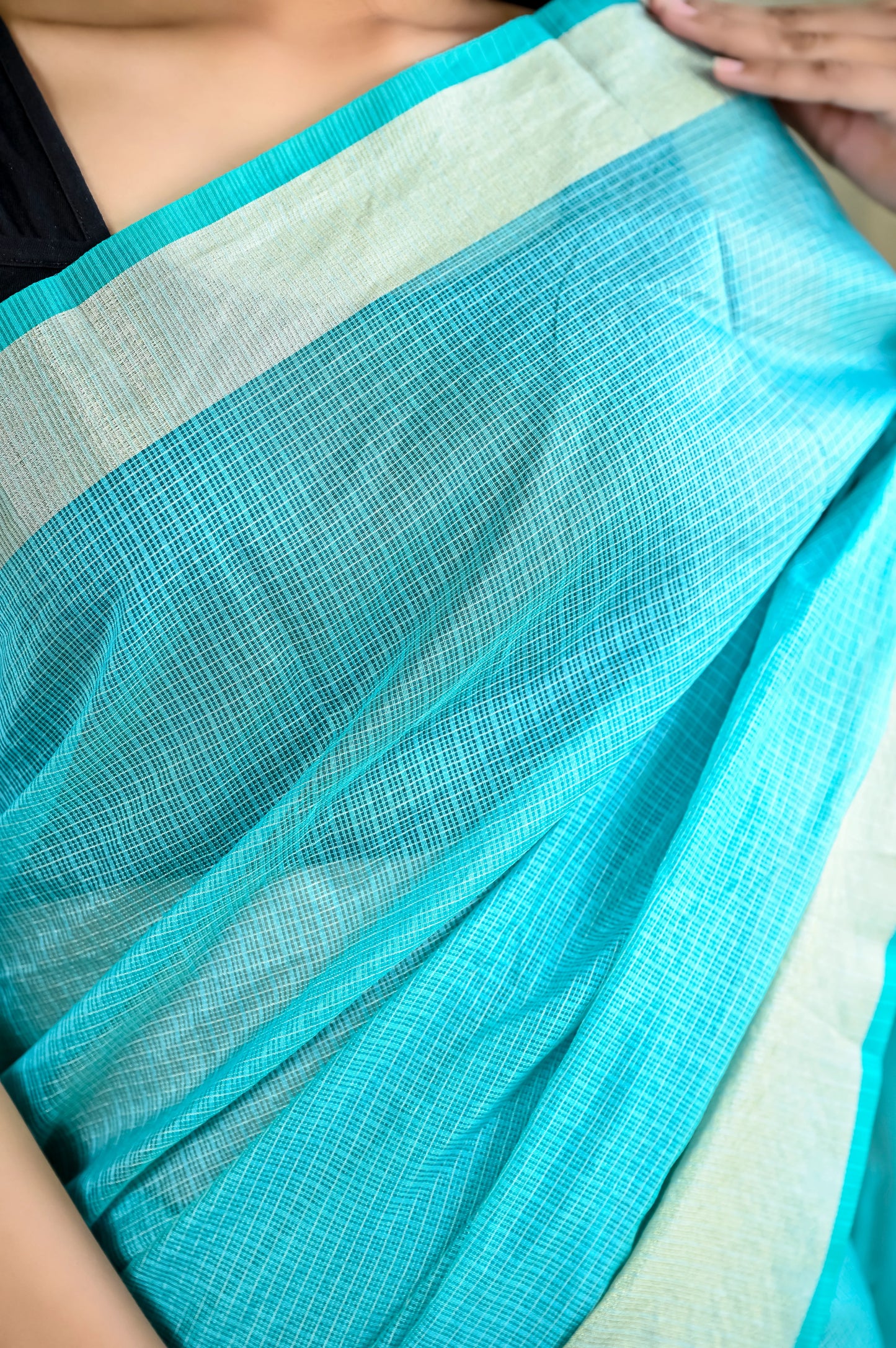 Turquoise color kota silk saree with golden border