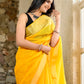 Bright yellow color kota silk saree with heavy zari border