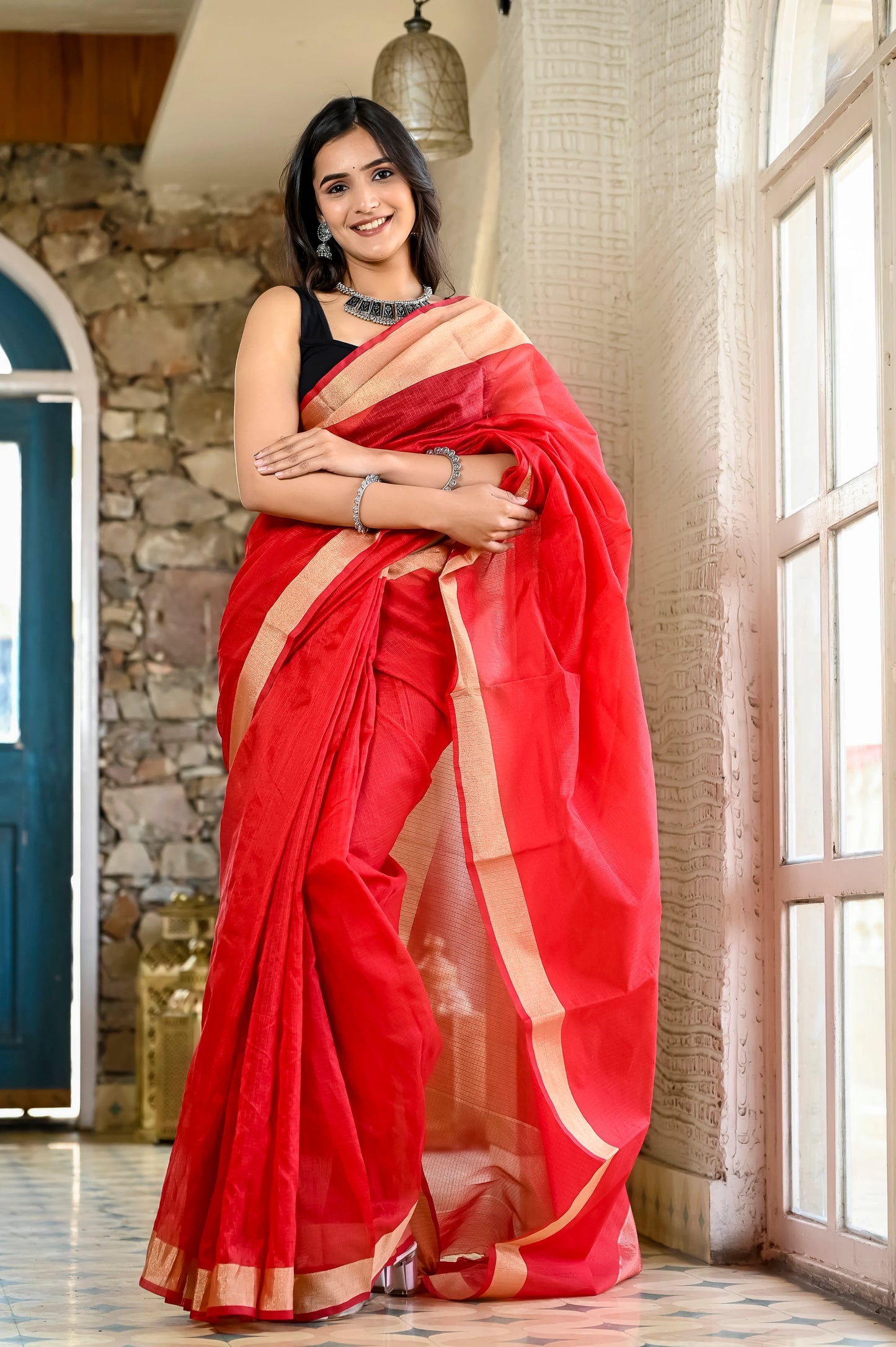Red color kota silk saree with heavy zari border
