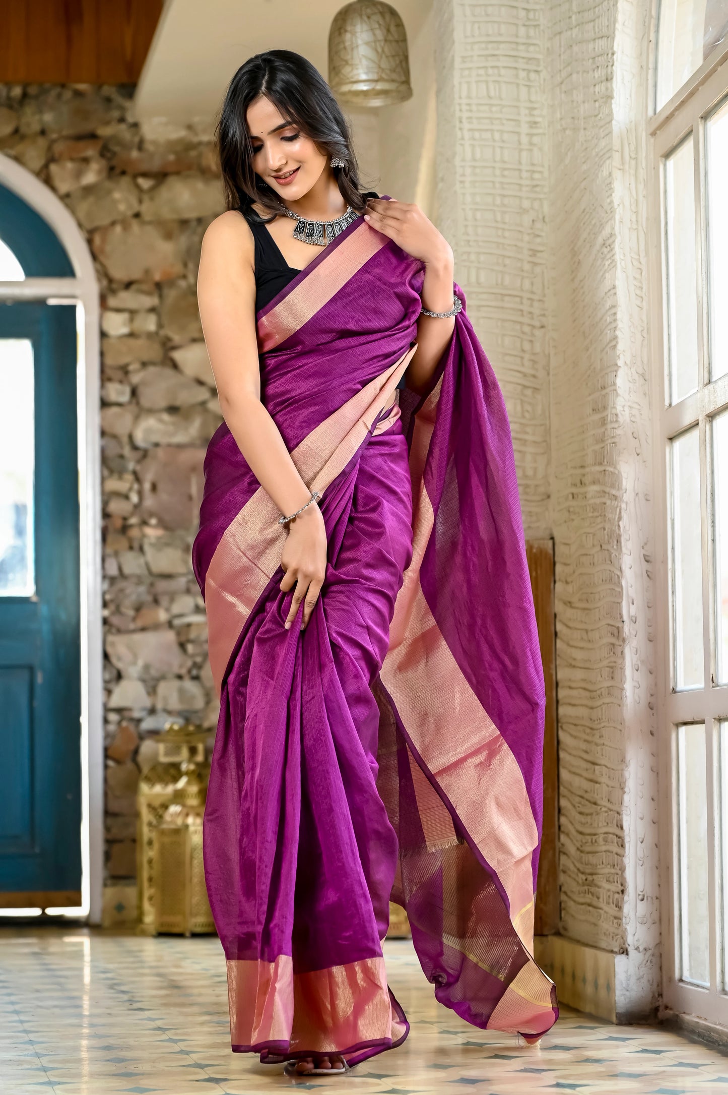 Purple color kota silk saree with heavy zari border