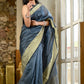 Grey color kota silk saree with heavy zari golden border