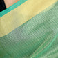 Pista green color kota silk saree with heavy zari border