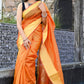 Orange color kota silk saree with heavy border
