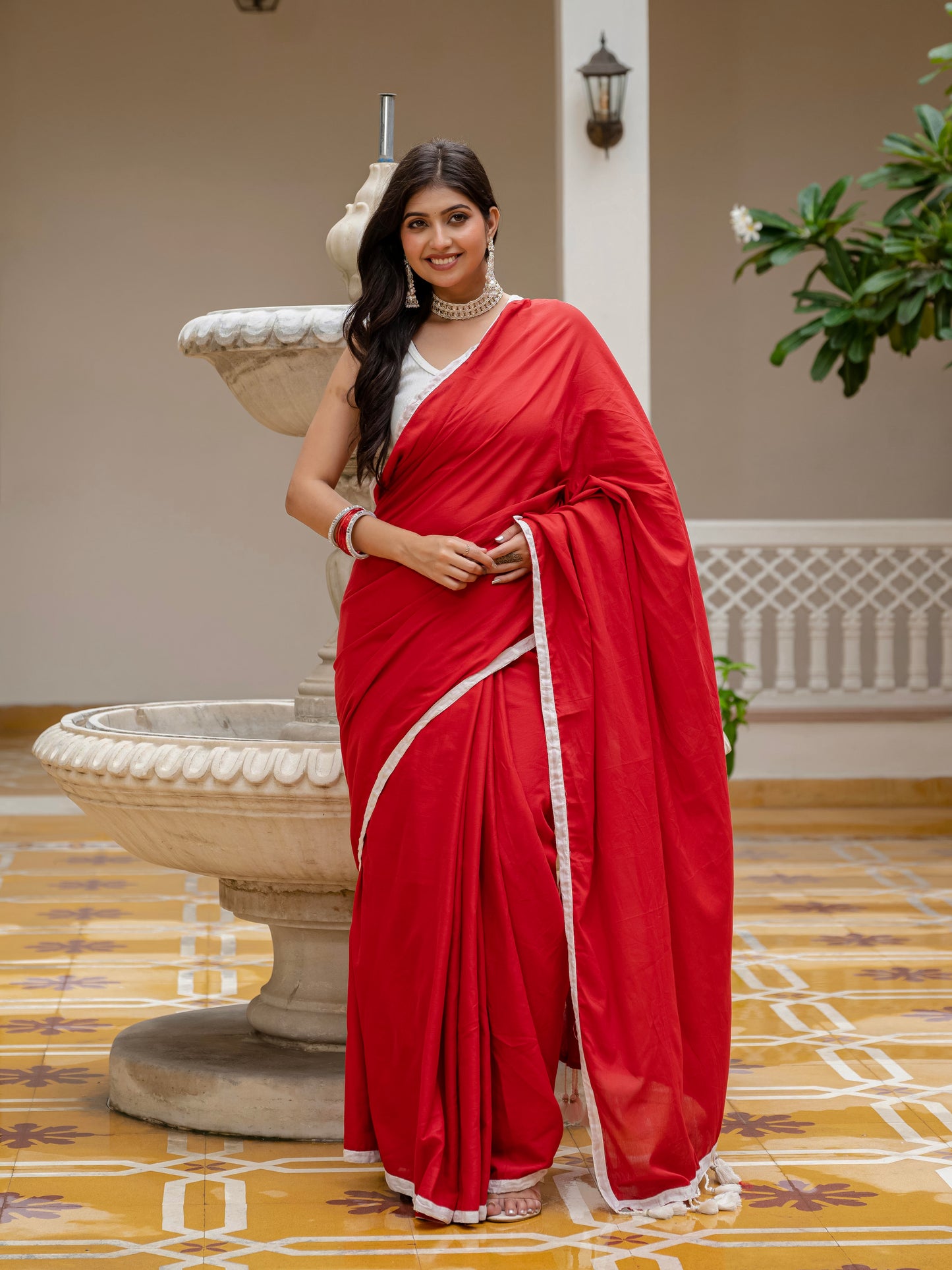 Red saree with tussels