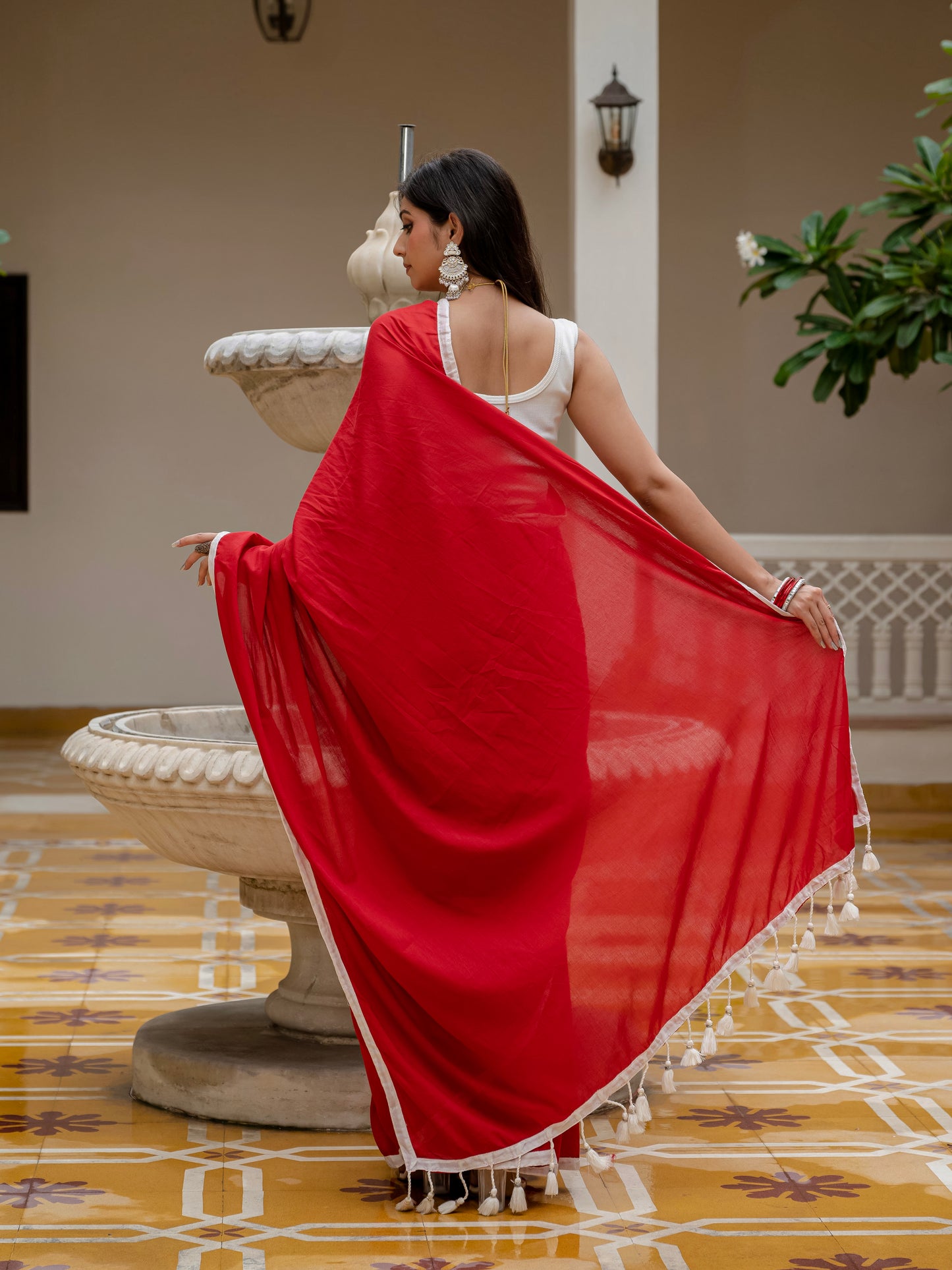 Red saree with tussels