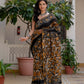 Black yellow batik printed silk saree