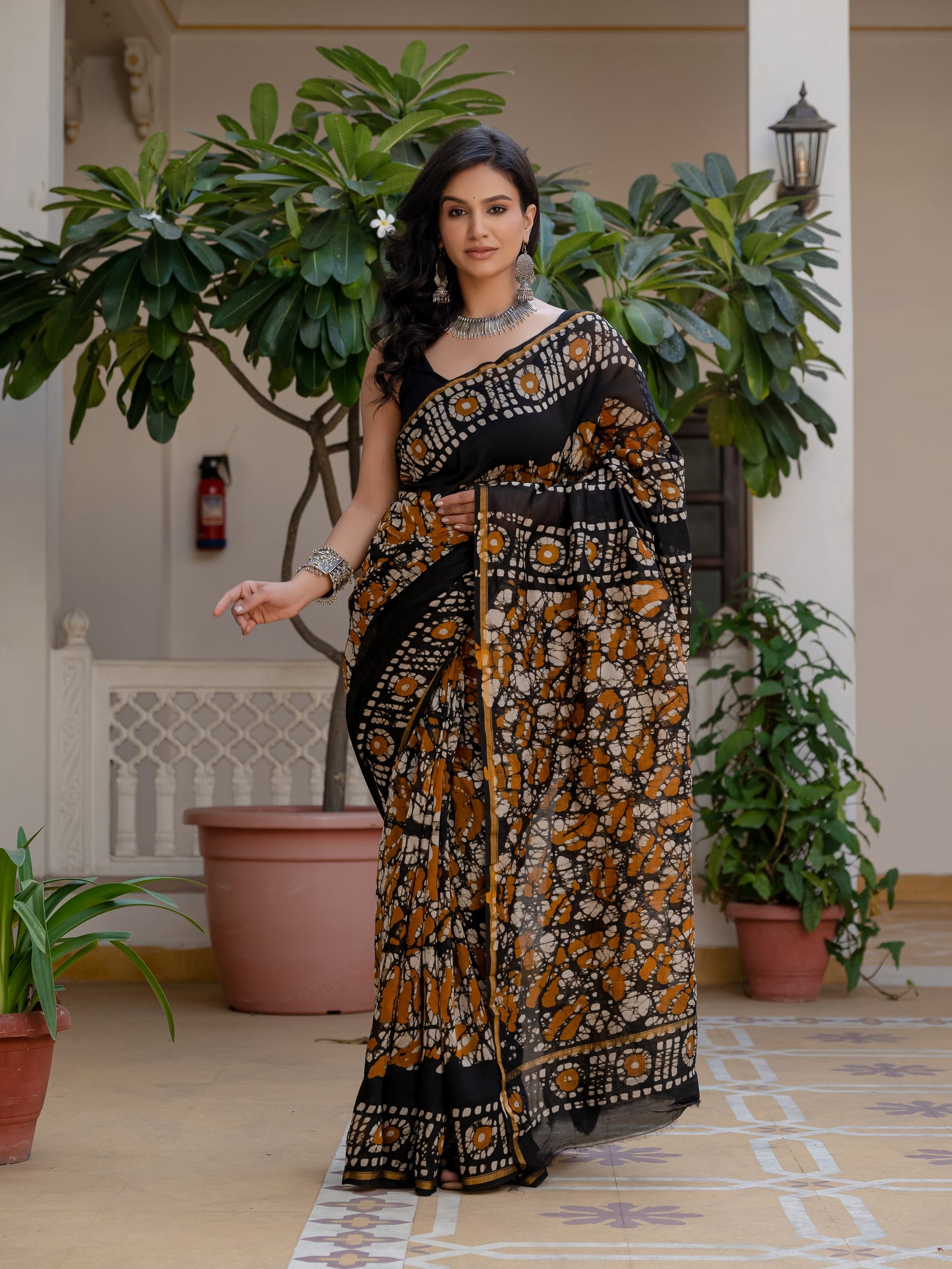 Black yellow batik printed silk saree