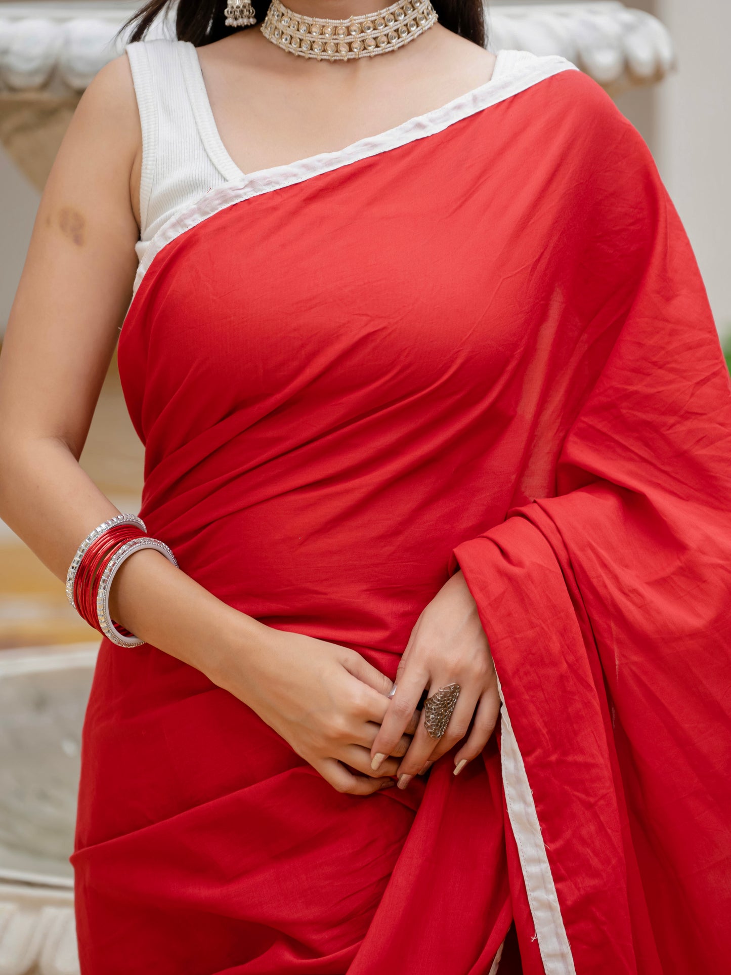 Red saree with tussels