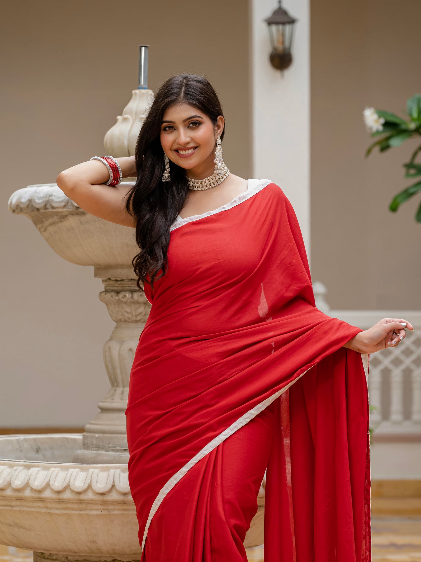 Red saree with tussels